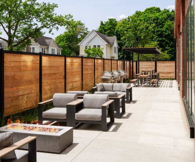 outdoor patio with seating and fireplaces